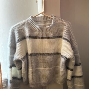 striped gray and white women's sweater